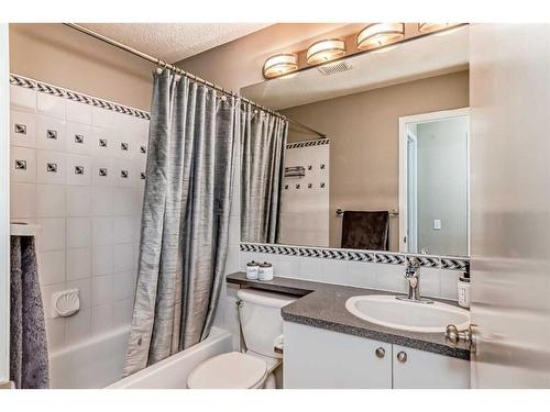 75 River Rock Way Se, Calgary, AB - Indoor Photo Showing Bathroom