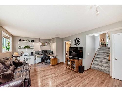 75 River Rock Way Se, Calgary, AB - Indoor Photo Showing Living Room