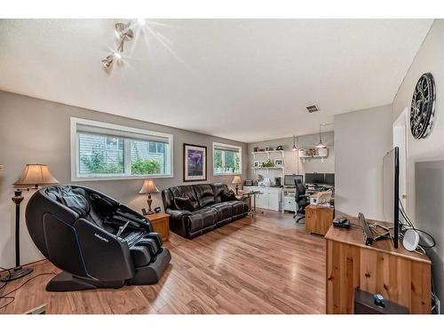 75 River Rock Way Se, Calgary, AB - Indoor Photo Showing Living Room