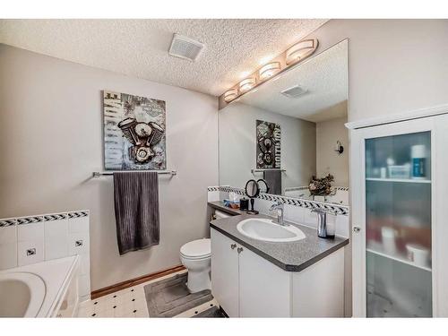 75 River Rock Way Se, Calgary, AB - Indoor Photo Showing Bathroom