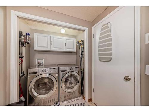 75 River Rock Way Se, Calgary, AB - Indoor Photo Showing Laundry Room