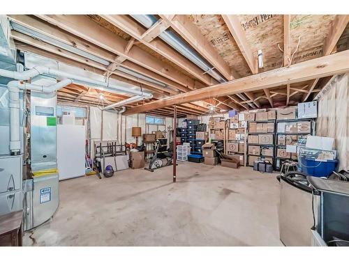 75 River Rock Way Se, Calgary, AB - Indoor Photo Showing Basement