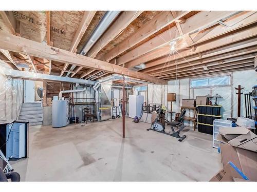 75 River Rock Way Se, Calgary, AB - Indoor Photo Showing Basement