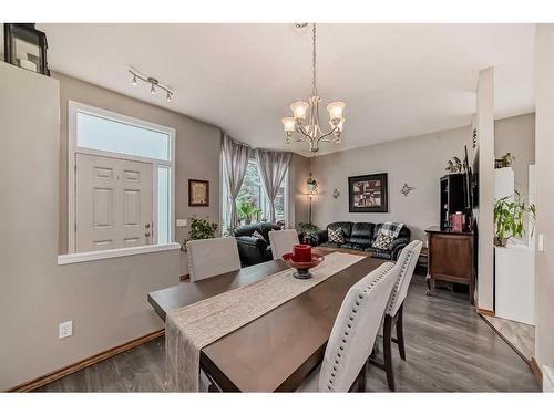 75 River Rock Way Se, Calgary, AB - Indoor Photo Showing Dining Room