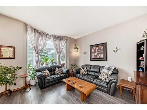 75 River Rock Way Se, Calgary, AB - Indoor Photo Showing Living Room