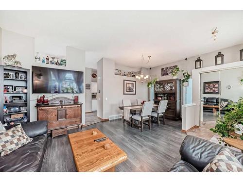 75 River Rock Way Se, Calgary, AB - Indoor Photo Showing Living Room