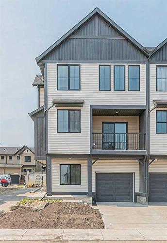 117 South Point Manor Sw, Airdrie, AB - Outdoor With Balcony With Facade