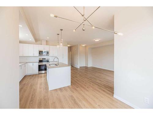 117 South Point Manor Sw, Airdrie, AB - Indoor Photo Showing Kitchen