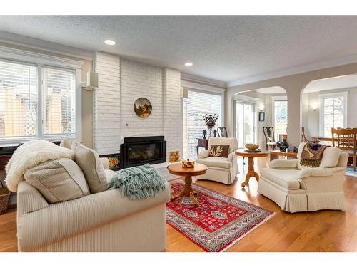 14228 Park Estates Drive Se, Calgary, AB - Indoor Photo Showing Living Room With Fireplace