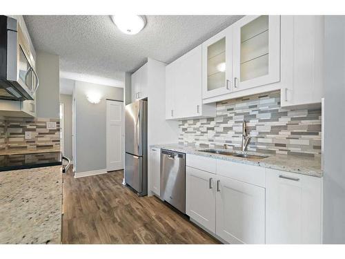 614-111 14 Avenue Se, Calgary, AB - Indoor Photo Showing Kitchen With Stainless Steel Kitchen With Double Sink With Upgraded Kitchen