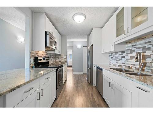 614-111 14 Avenue Se, Calgary, AB - Indoor Photo Showing Kitchen With Stainless Steel Kitchen With Double Sink With Upgraded Kitchen