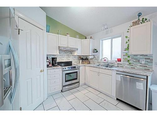 539 Pioneer Drive, Irricana, AB - Indoor Photo Showing Kitchen With Double Sink