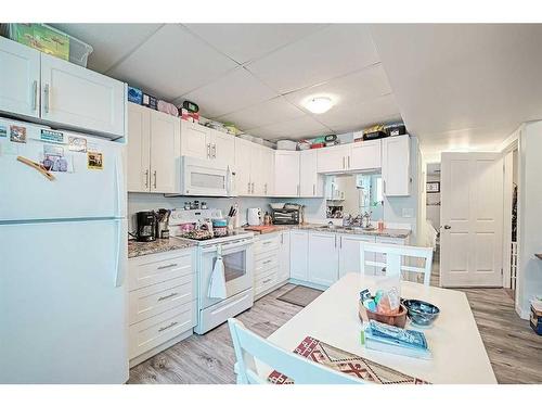 539 Pioneer Drive, Irricana, AB - Indoor Photo Showing Kitchen With Double Sink