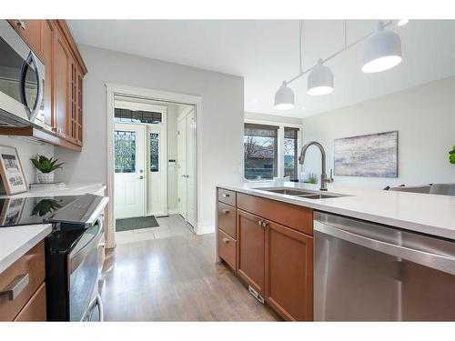 1613 18 Avenue Nw, Calgary, AB - Indoor Photo Showing Kitchen With Double Sink