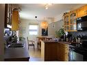 2223 Halifax Crescent Nw, Calgary, AB  - Indoor Photo Showing Kitchen With Double Sink 