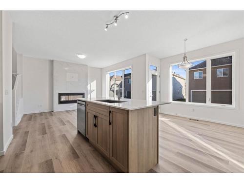 91 Cityline Heath Ne, Calgary, AB - Indoor Photo Showing Other Room With Fireplace