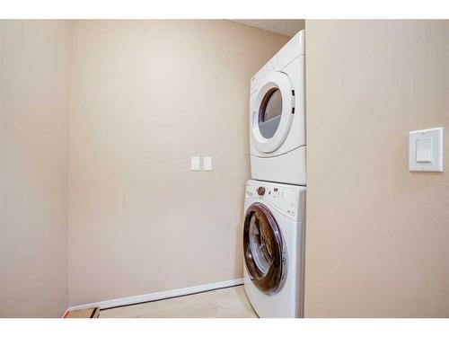 117-33 Arbour Grove Close Nw, Calgary, AB - Indoor Photo Showing Laundry Room