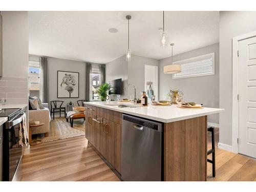 133 Ambleside Heath Nw, Calgary, AB - Indoor Photo Showing Kitchen With Upgraded Kitchen