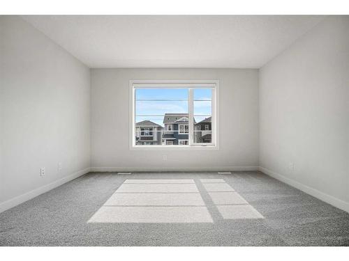 18 Amblefield Passage Nw, Calgary, AB - Indoor Photo Showing Other Room