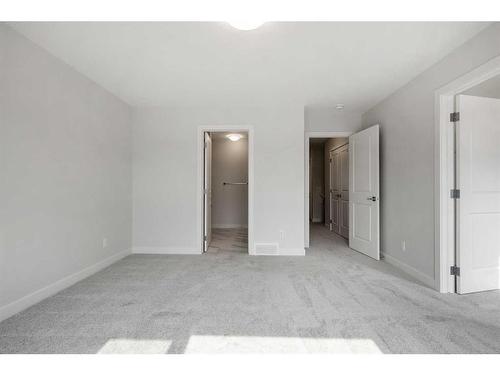 18 Amblefield Passage Nw, Calgary, AB - Indoor Photo Showing Other Room