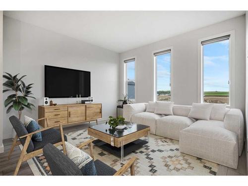 18 Amblefield Passage Nw, Calgary, AB - Indoor Photo Showing Living Room