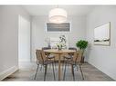 18 Amblefield Passage Nw, Calgary, AB  - Indoor Photo Showing Dining Room 