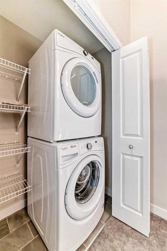 0037463783-133 Sage Hill Grove Nw, Calgary, AB - Indoor Photo Showing Laundry Room