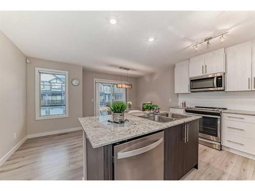 0037463783-133 Sage Hill Grove Nw, Calgary, AB - Indoor Photo Showing Kitchen With Stainless Steel Kitchen With Double Sink With Upgraded Kitchen