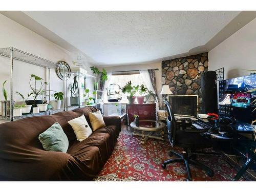 2811 19 Street Nw, Calgary, AB - Indoor Photo Showing Living Room With Fireplace