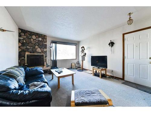 2811 19 Street Nw, Calgary, AB - Indoor Photo Showing Living Room With Fireplace