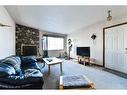 2811 19 Street Nw, Calgary, AB  - Indoor Photo Showing Living Room With Fireplace 