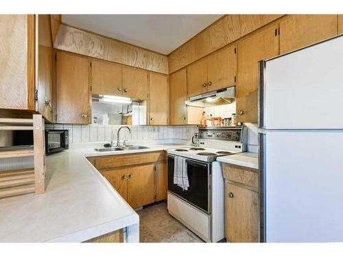 2811 19 Street Nw, Calgary, AB - Indoor Photo Showing Kitchen With Double Sink