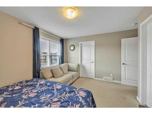 9 Masters Street Se, Calgary, AB - Indoor Photo Showing Bedroom