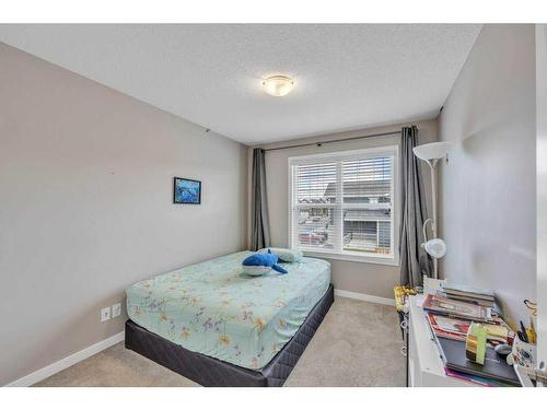 9 Masters Street Se, Calgary, AB - Indoor Photo Showing Bedroom