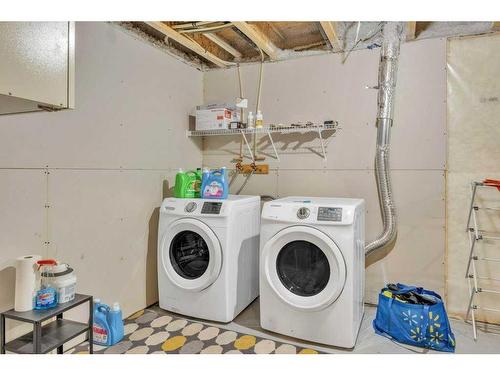 9 Masters Street Se, Calgary, AB - Indoor Photo Showing Laundry Room