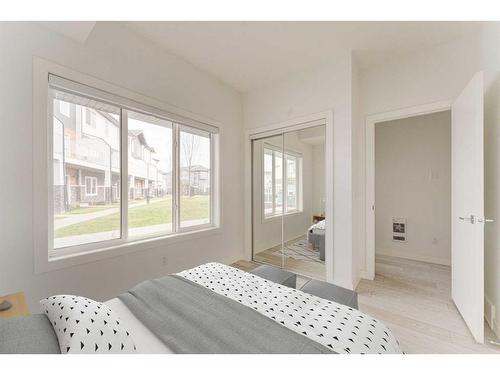 402-280 Chelsea Road, Chestermere, AB - Indoor Photo Showing Bedroom