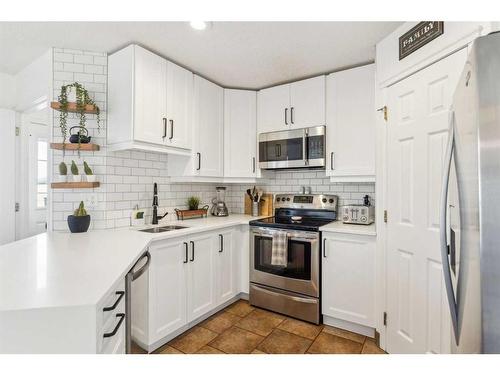 9 Citadel Forest Link Nw, Calgary, AB - Indoor Photo Showing Kitchen With Double Sink