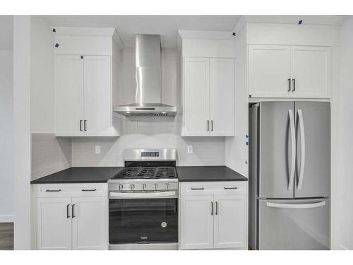 283 Hotchkiss Manor, Calgary, AB - Indoor Photo Showing Kitchen