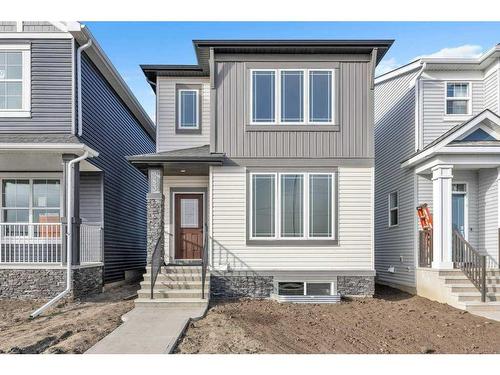 283 Hotchkiss Manor, Calgary, AB - Outdoor With Facade