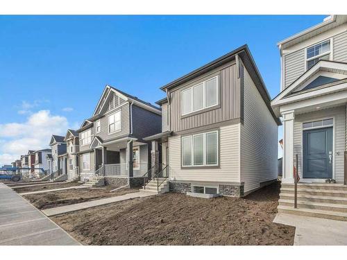 283 Hotchkiss Manor, Calgary, AB - Outdoor With Facade