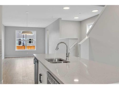 188 Hotchkiss Drive Se, Calgary, AB - Indoor Photo Showing Kitchen With Double Sink