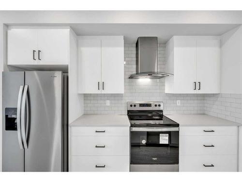 188 Hotchkiss Drive Se, Calgary, AB - Indoor Photo Showing Kitchen With Upgraded Kitchen