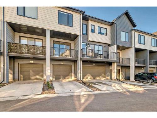 207 Evanscrest Square Nw, Calgary, AB - Outdoor With Balcony With Facade