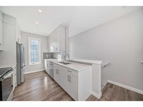 207 Evanscrest Square Nw, Calgary, AB - Indoor Photo Showing Kitchen