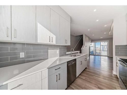 207 Evanscrest Square Nw, Calgary, AB - Indoor Photo Showing Kitchen With Upgraded Kitchen