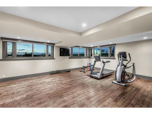 178068 112 Street, De Winton, AB - Indoor Photo Showing Gym Room