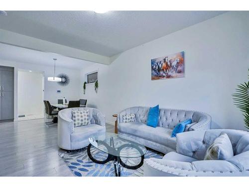 23 Saddlelake Common Ne, Calgary, AB - Indoor Photo Showing Living Room