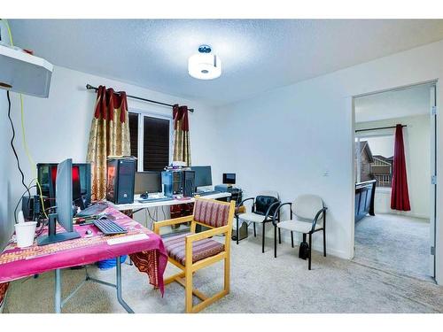 23 Saddlelake Common Ne, Calgary, AB - Indoor Photo Showing Other Room