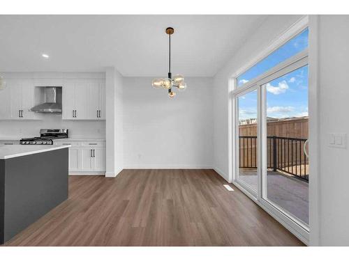 51 Heritage Circle, Cochrane, AB - Indoor Photo Showing Kitchen