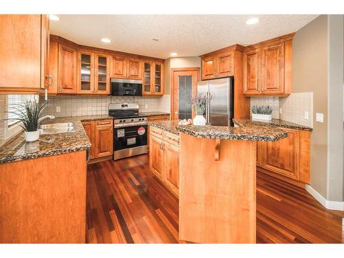 109 Everglade Circle Sw, Calgary, AB - Indoor Photo Showing Kitchen With Stainless Steel Kitchen